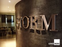 STORM metal logo signs